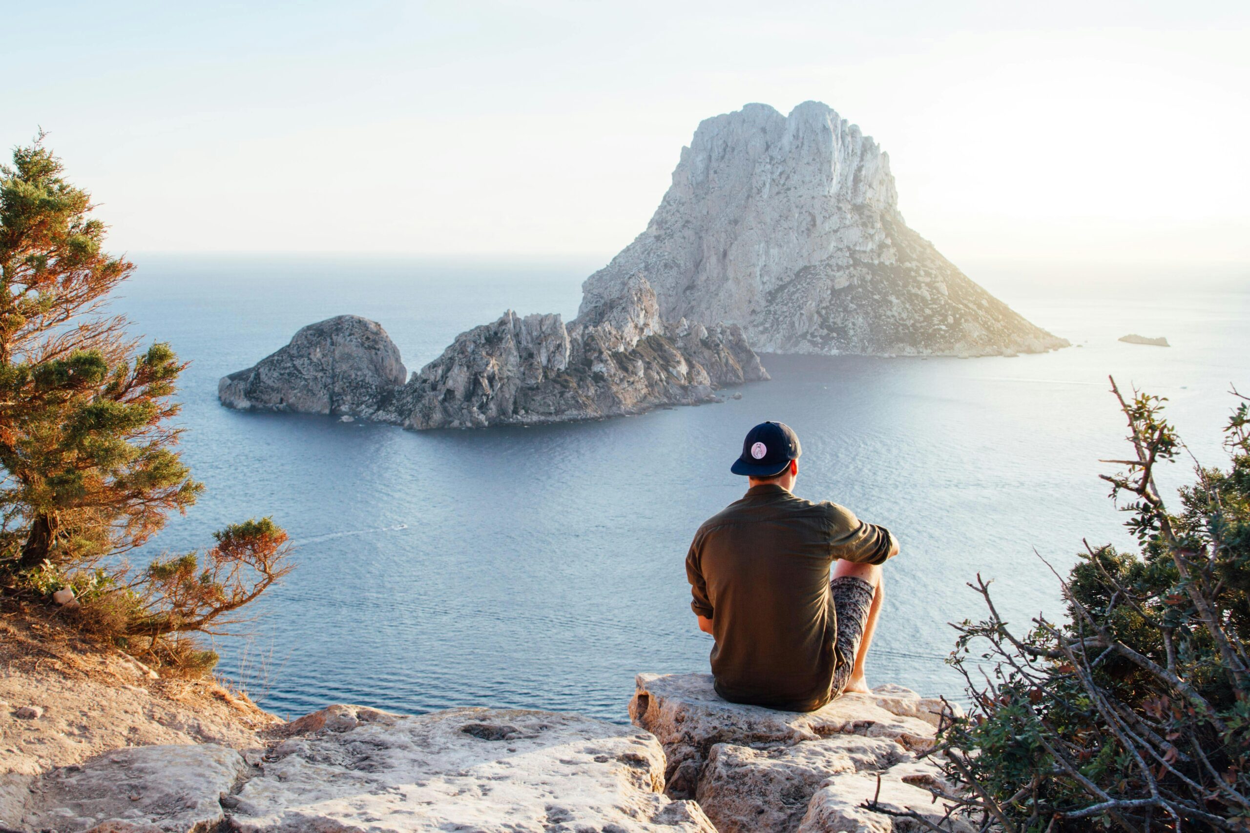 Person sitting by water
